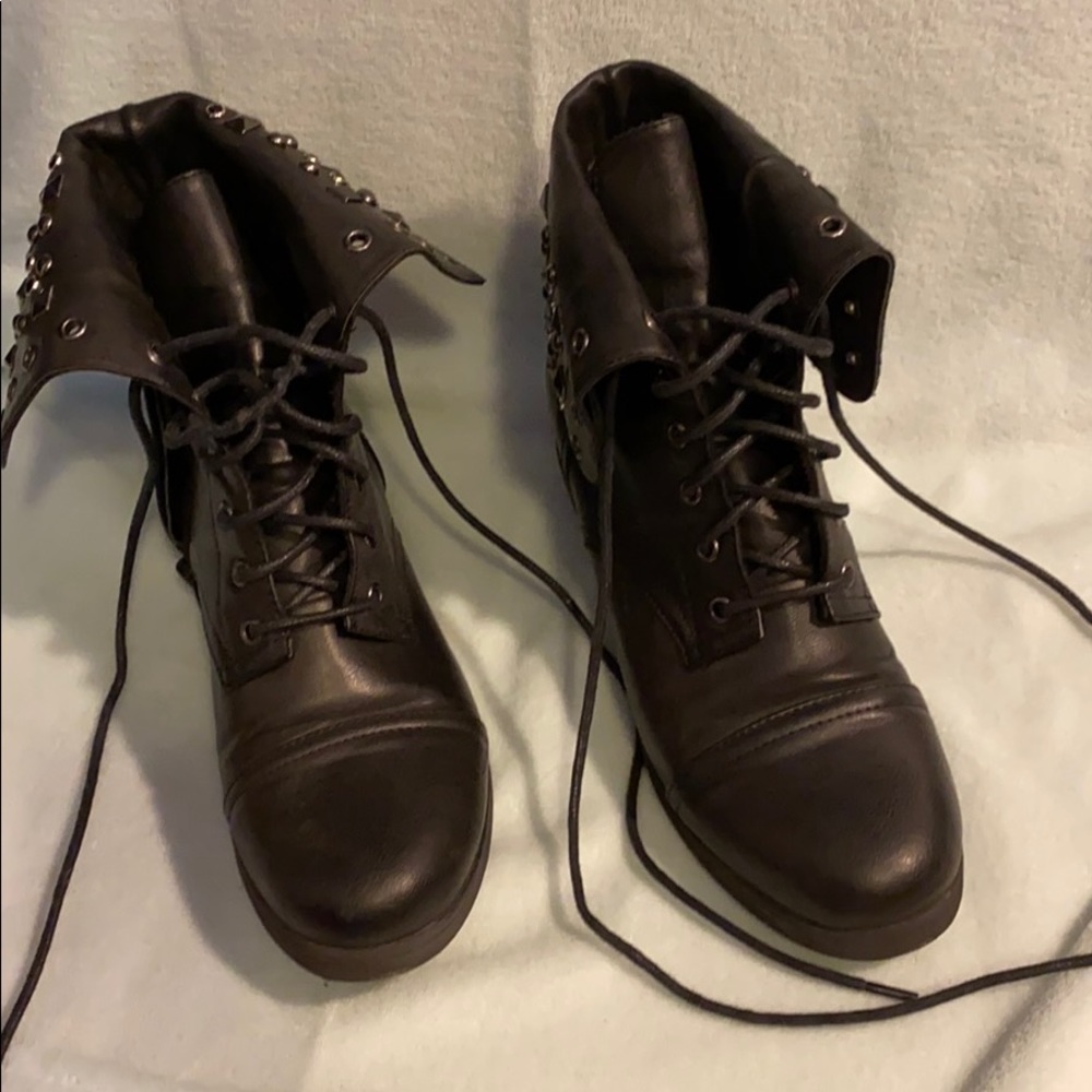 Black combat boots with studs
